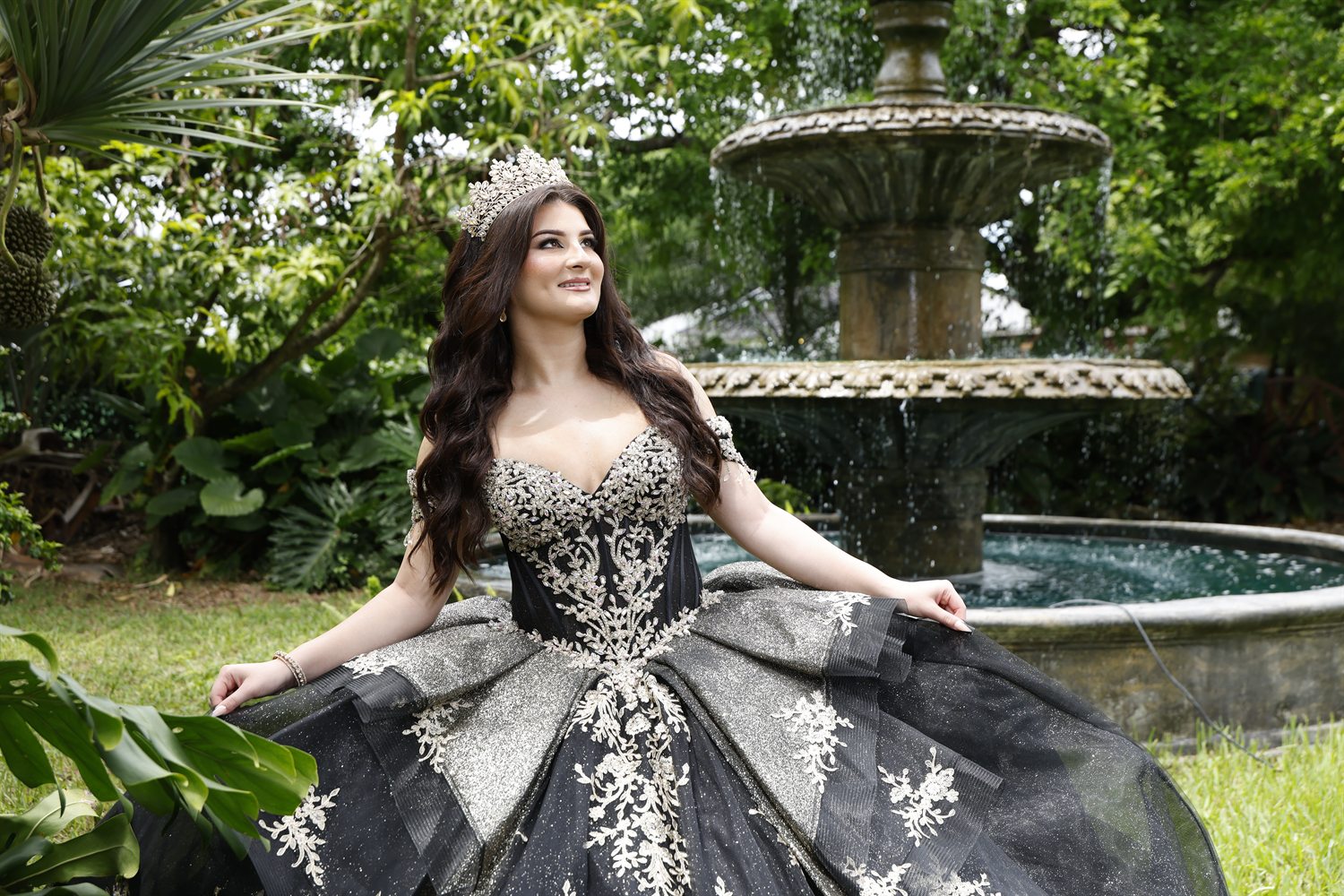 Isabella by the garden fountain